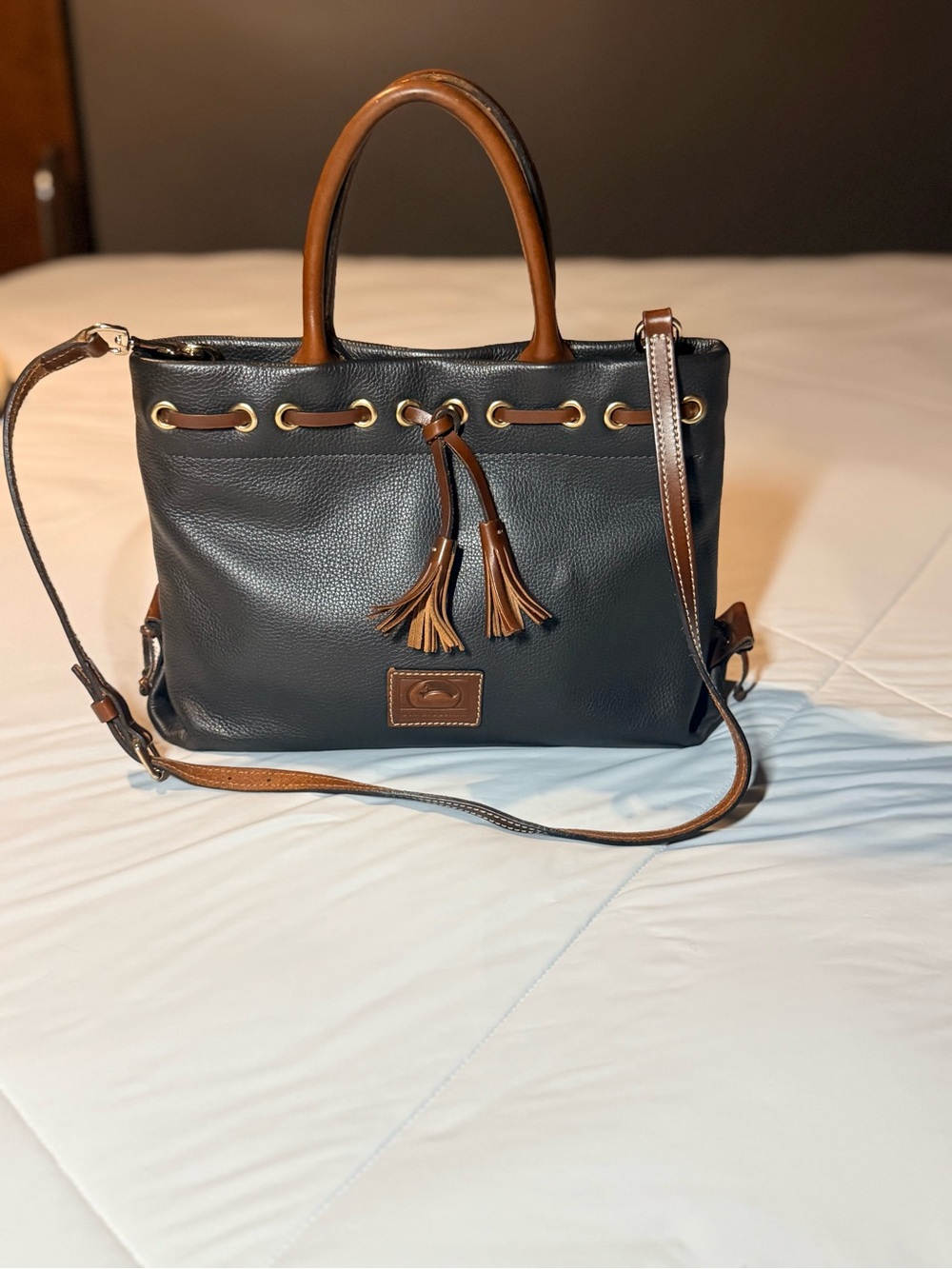 Dooney & Bourke Black Leather Tote with Brown Trim and Tassels